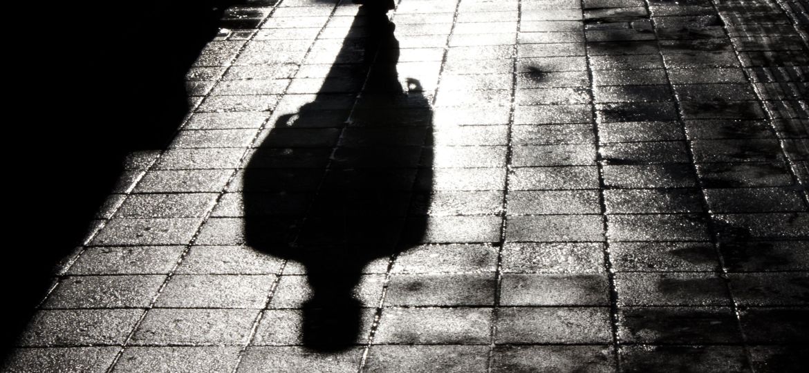 One man alone in the dark shadow silhouette