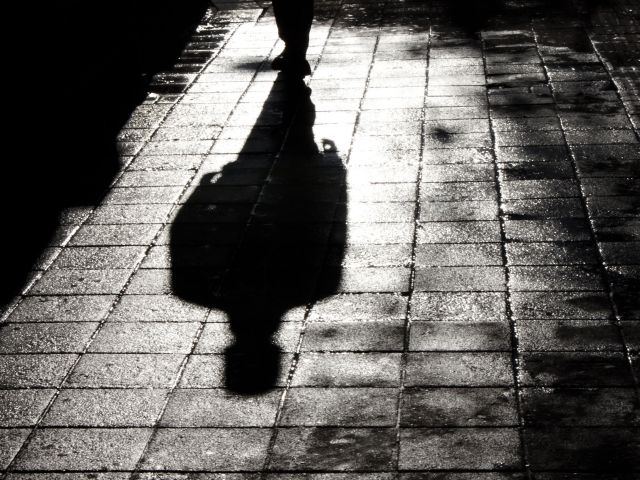One man alone in the dark shadow silhouette